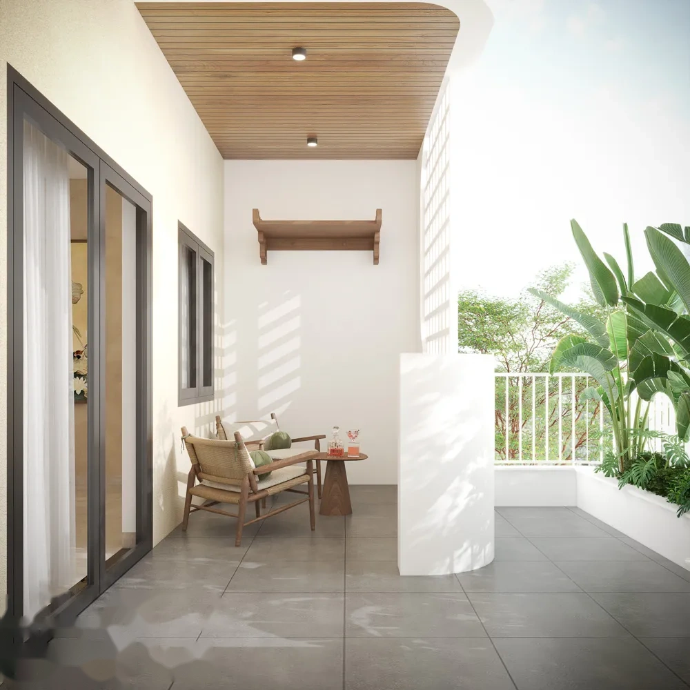 Khu vực sân thượng tầng tum thoáng mát với cây xanh và bàn trà